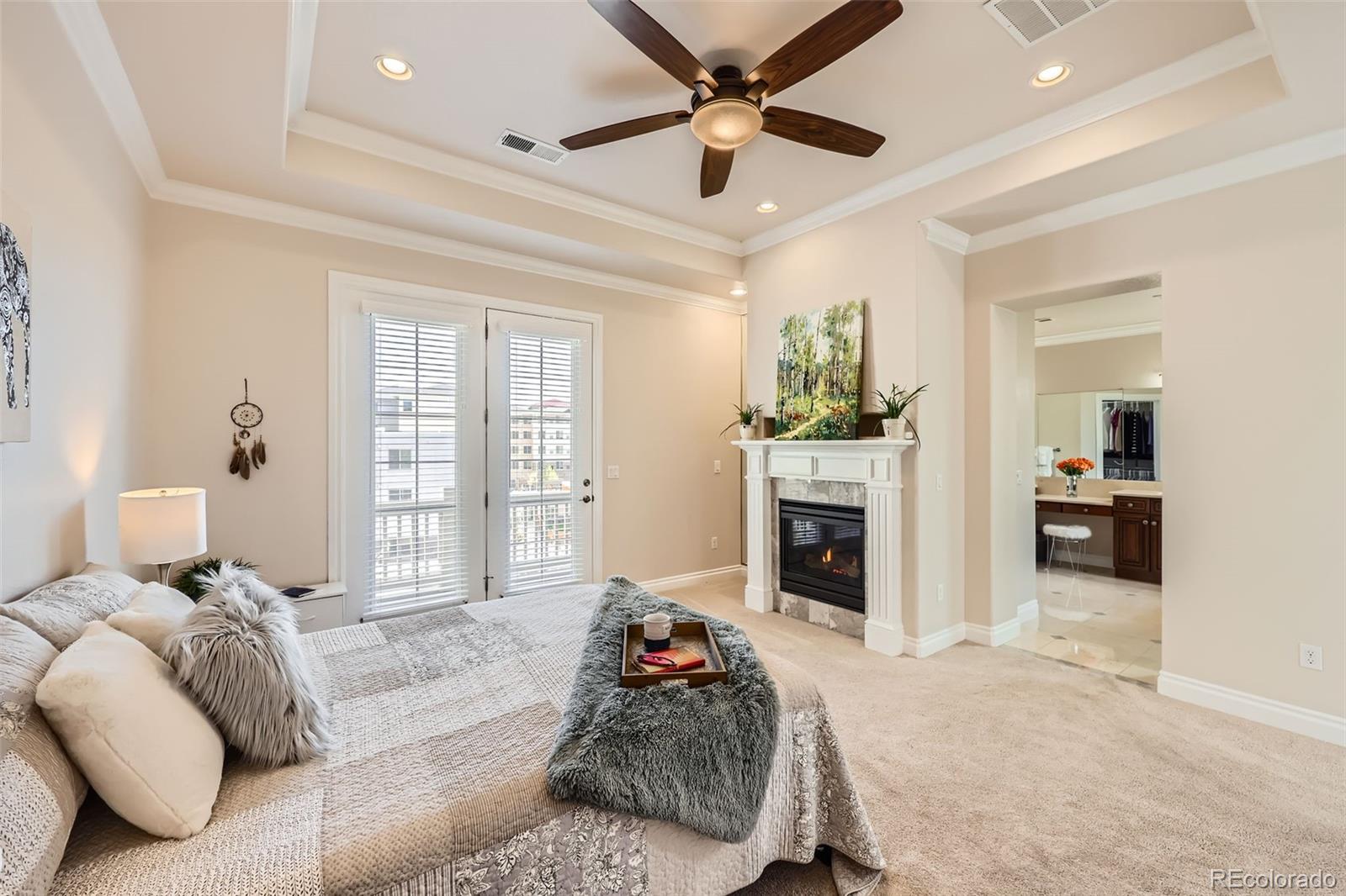 9182 Ridgegate Parkway Lone Tree, CO 80124 - Photo 14 of 31 a living room with furniture and a fireplace