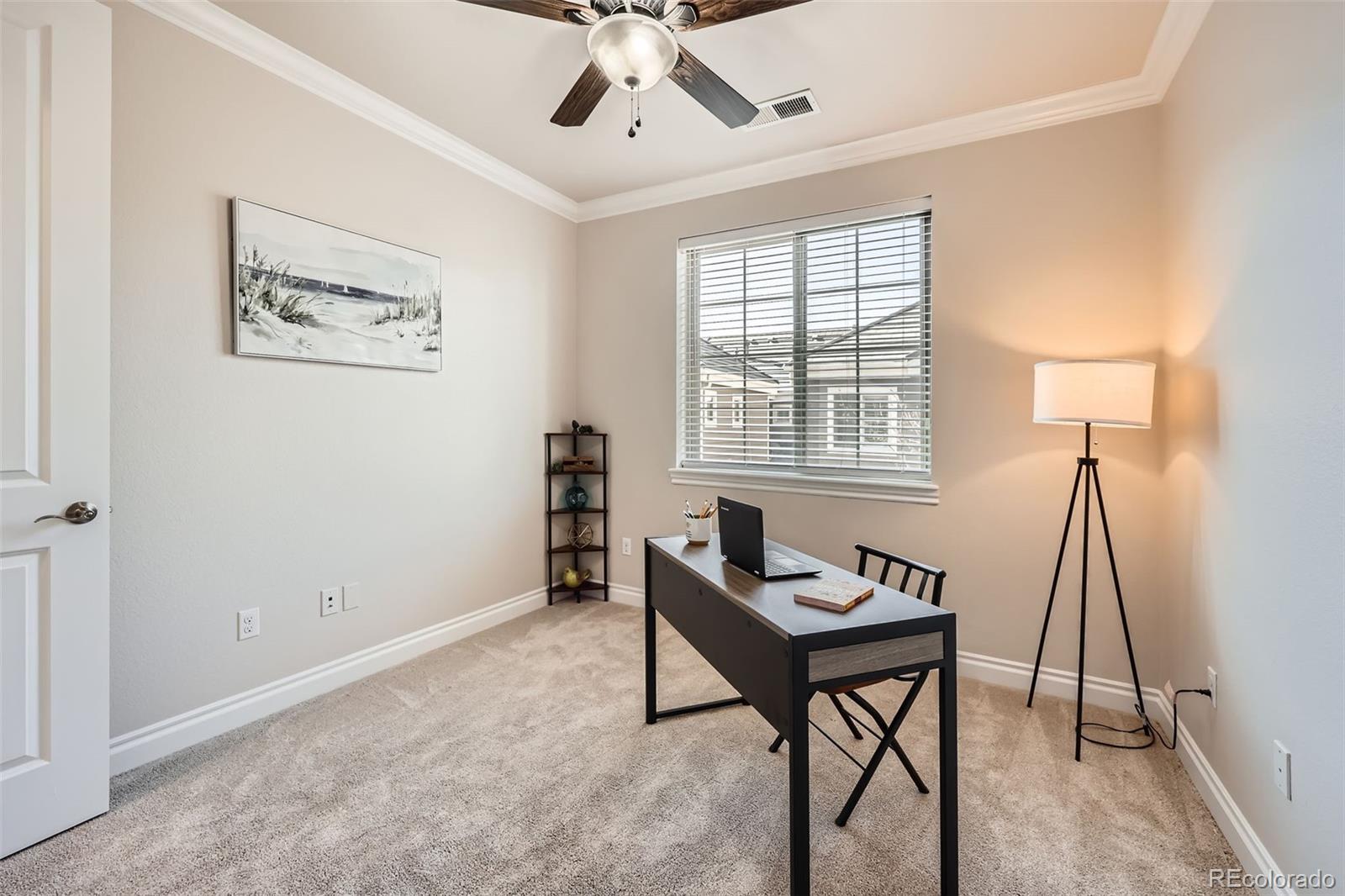 9182 Ridgegate Parkway Lone Tree, CO 80124 - Photo 19 of 31 a workspace with furniture and a window