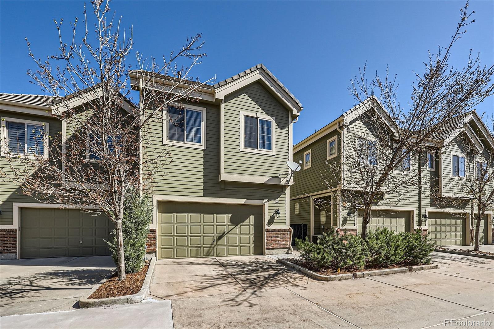 9182 Ridgegate Parkway Lone Tree, CO 80124 - Photo 26 of 31 a view of a house with a yard