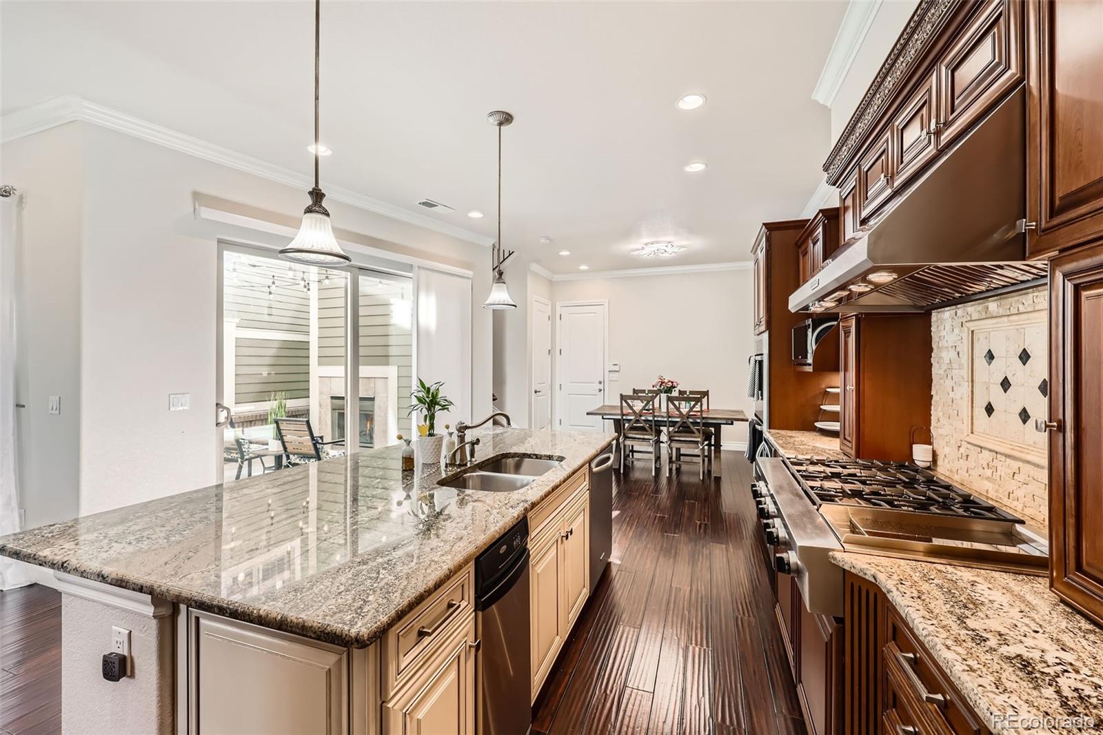 9182 Ridgegate Parkway Lone Tree, CO 80124 - Photo 9 of 31 a kitchen with lots of counter top space