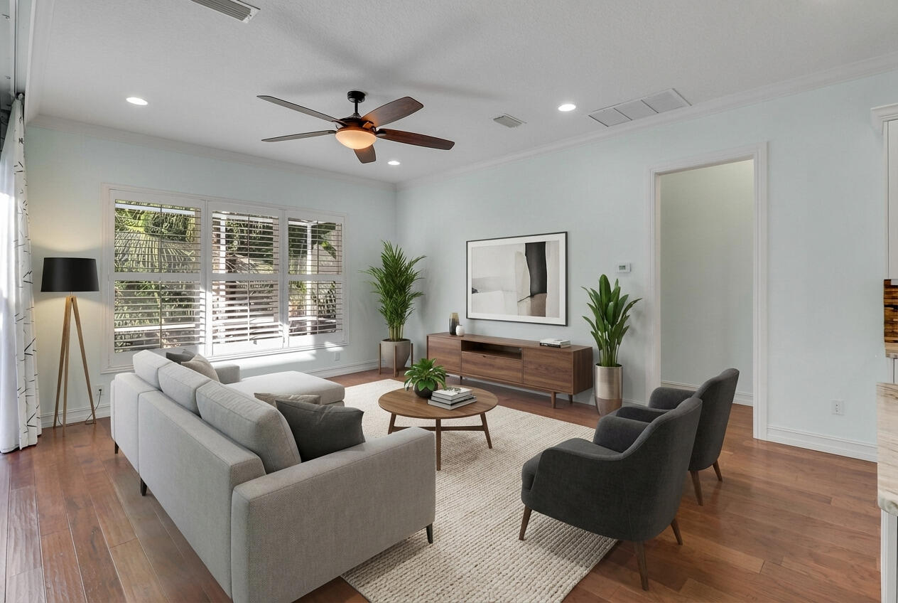 8415 Southeast Governors Way Hobe Sound, FL 33455 - Photo 11 of 105 a living room with furniture and a large window