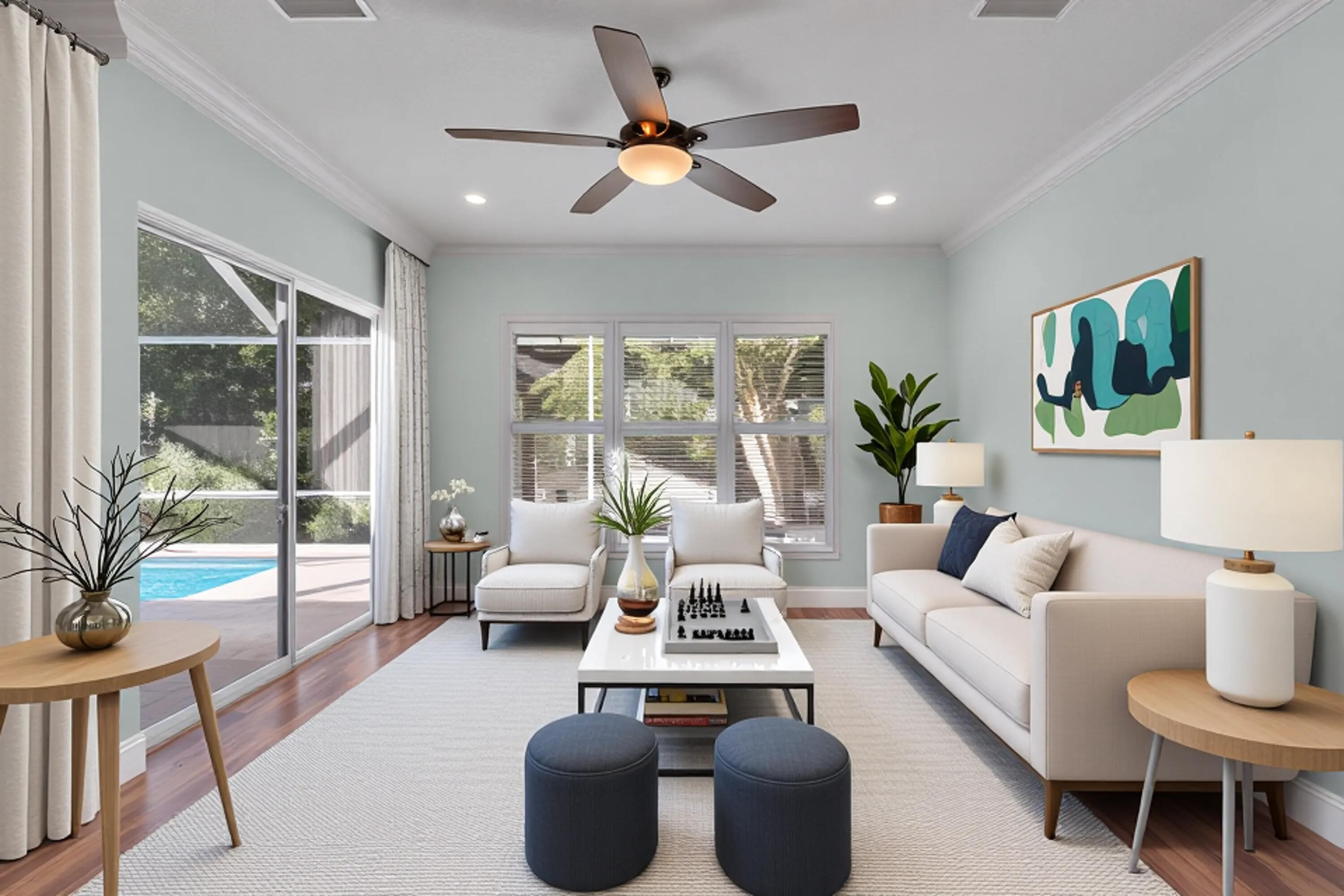 8415 Southeast Governors Way Hobe Sound, FL 33455 - Photo 12 of 105 a living room with furniture ceiling fan and a large window