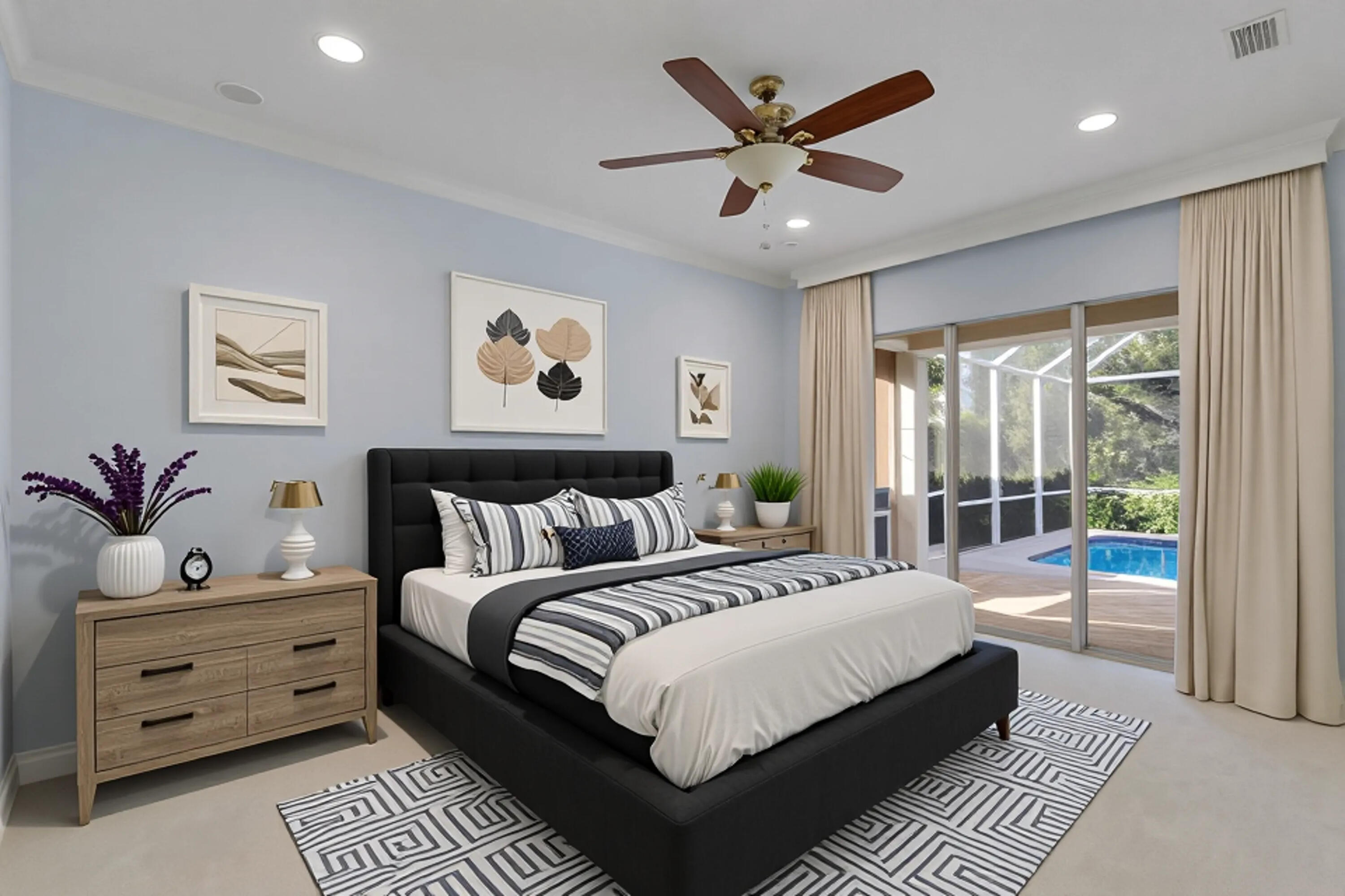 8415 Southeast Governors Way Hobe Sound, FL 33455 - Photo 23 of 105 a spacious bedroom with a large bed and a chandelier