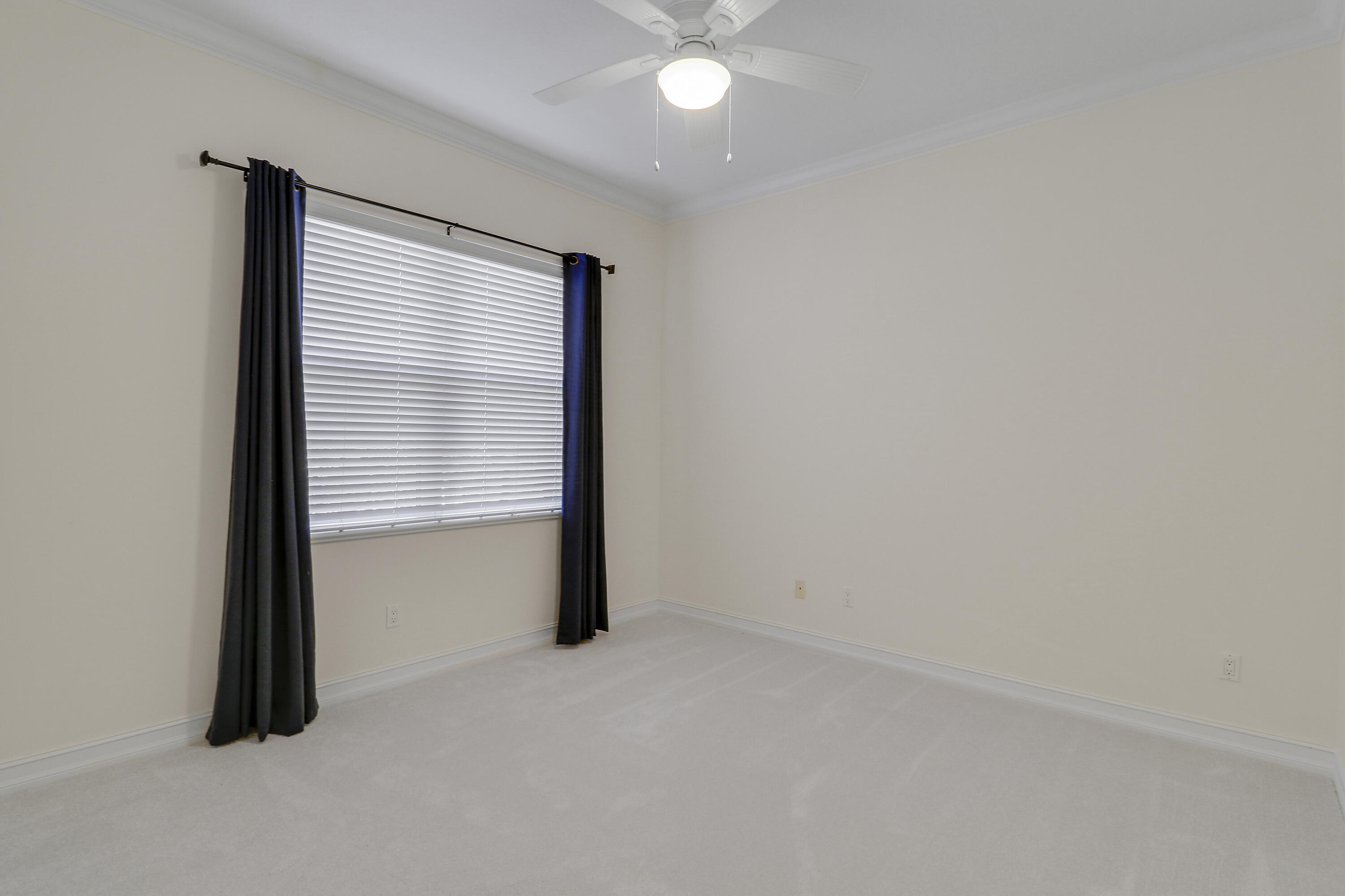 8415 Southeast Governors Way Hobe Sound, FL 33455 - Photo 28 of 105 an empty room with a window