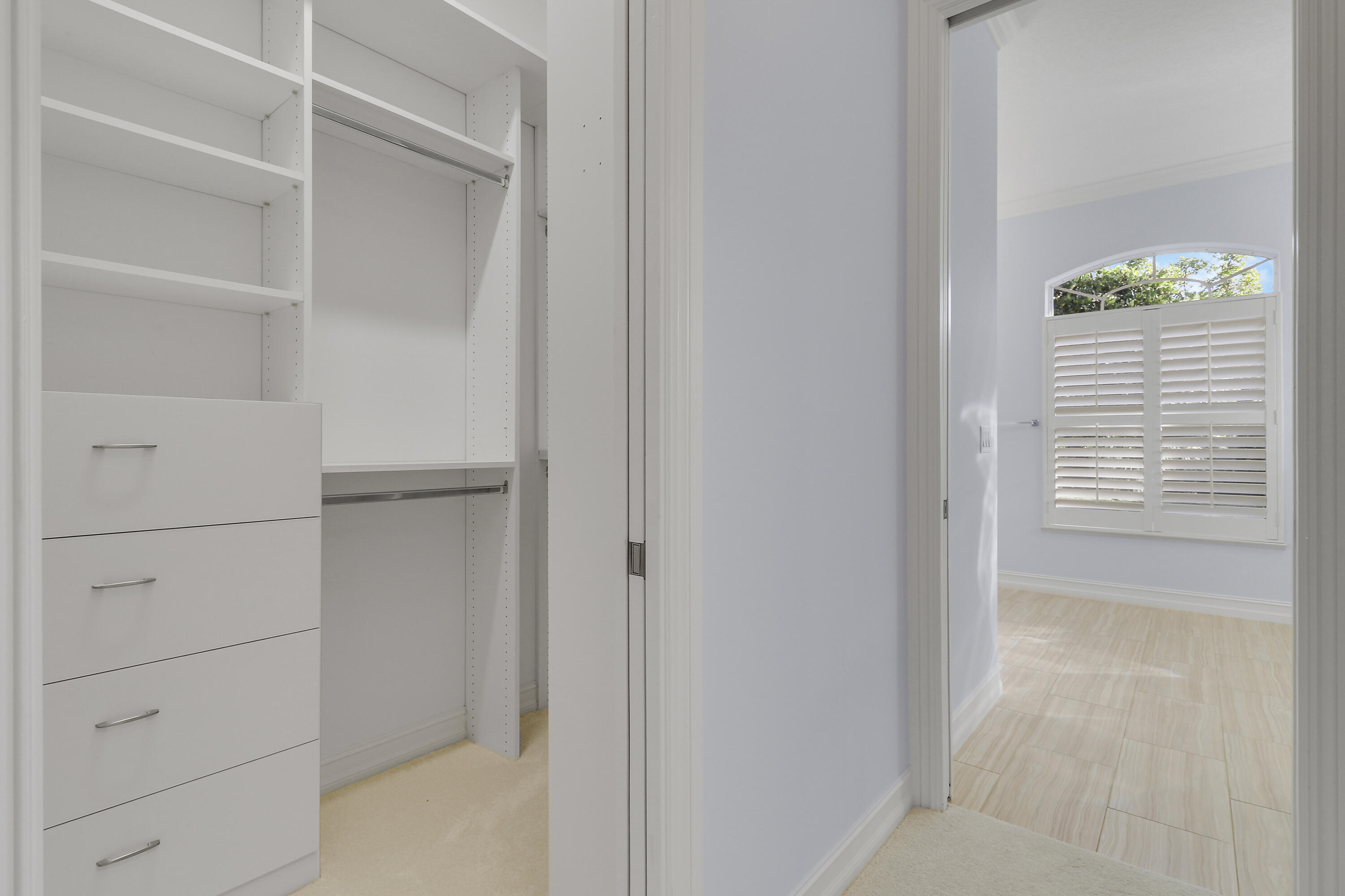 8415 Southeast Governors Way Hobe Sound, FL 33455 - Photo 39 of 105 a view of walk in closet