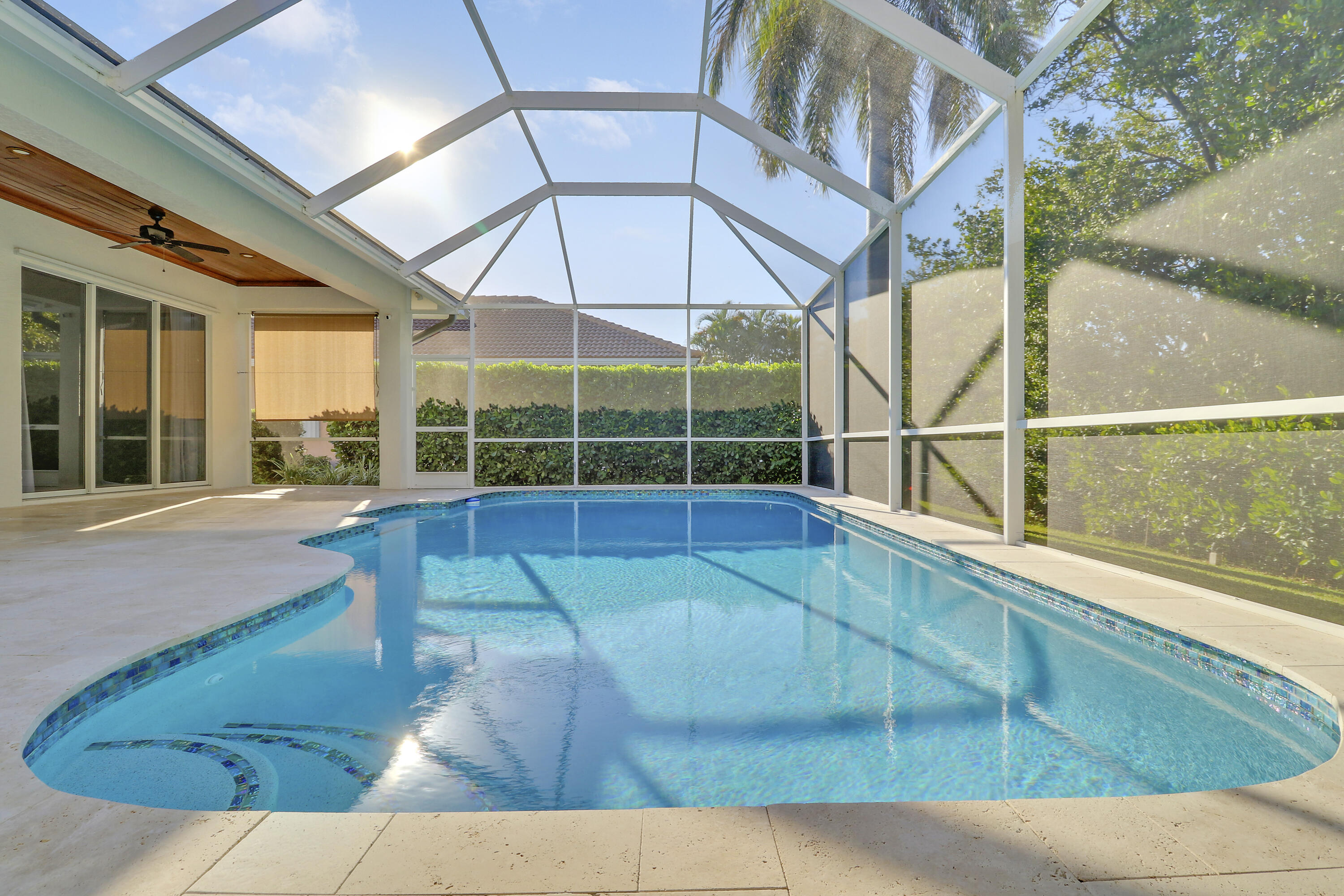 8415 Southeast Governors Way Hobe Sound, FL 33455 - Photo 73 of 105 a view of a swimming pool with an outdoor seating