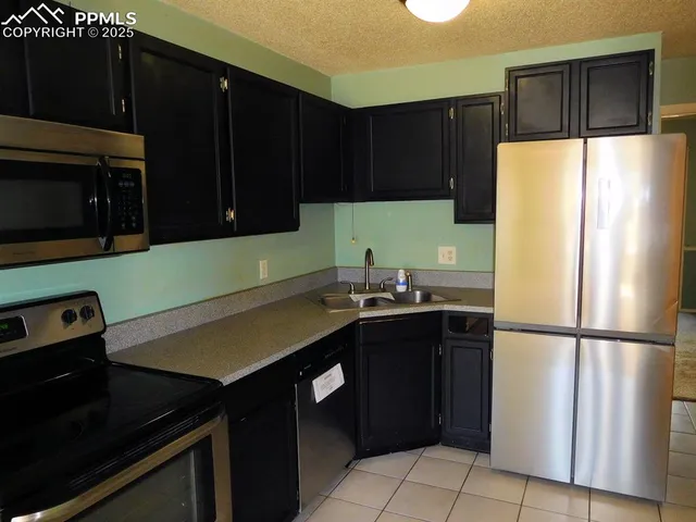 a bathroom with a toilet and a bathtub