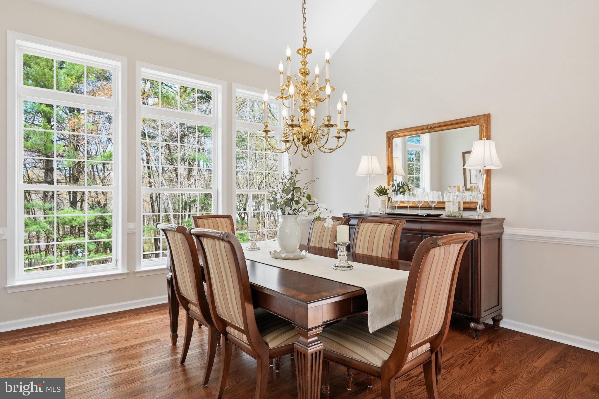 520 Sunset Hollow Road West Chester, PA 19380 - Photo 13 of 68 a view of a dining room with furniture window and wooden floor