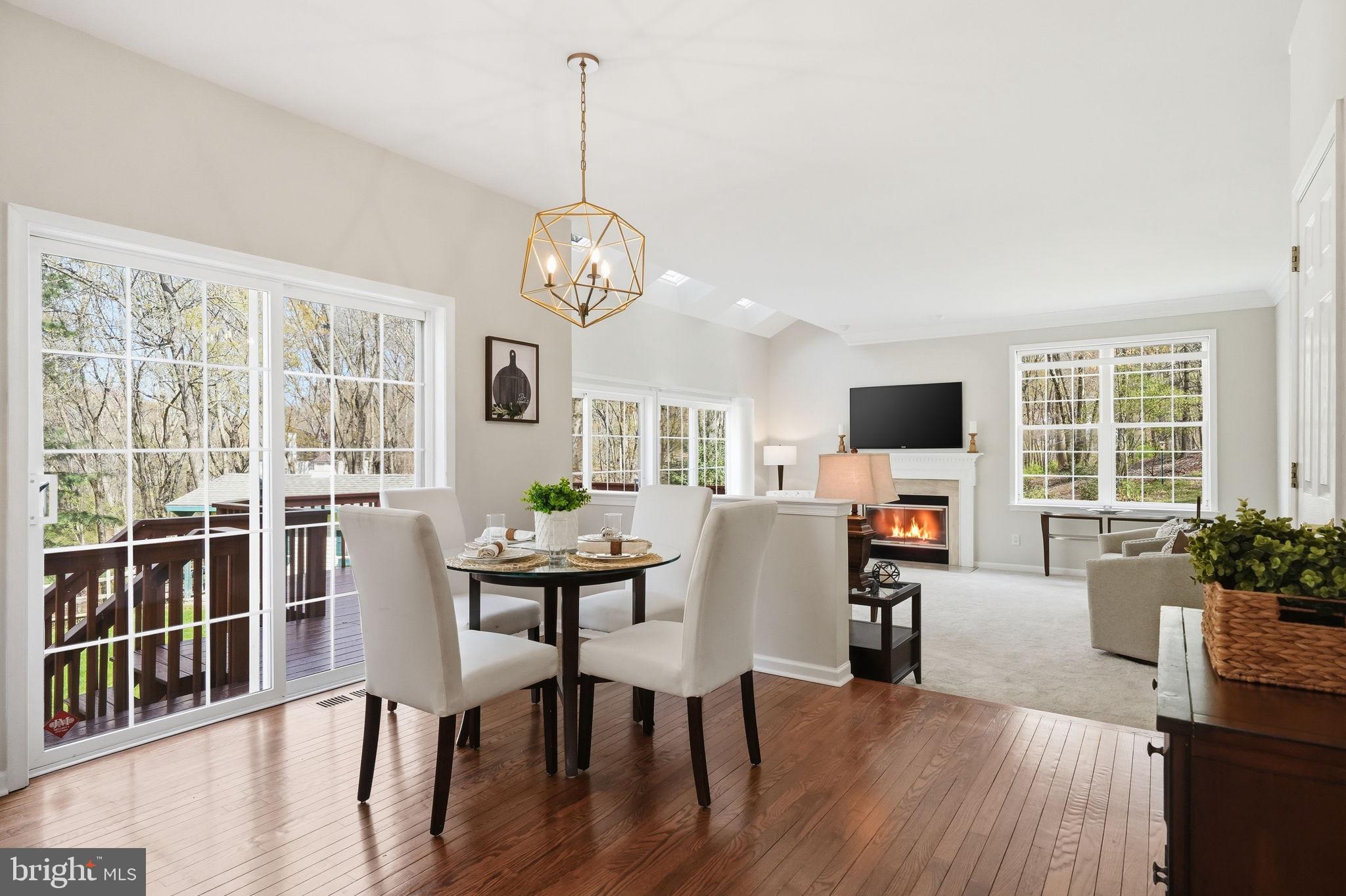 520 Sunset Hollow Road West Chester, PA 19380 - Photo 23 of 68 a view of a dining room with furniture window and wooden floor