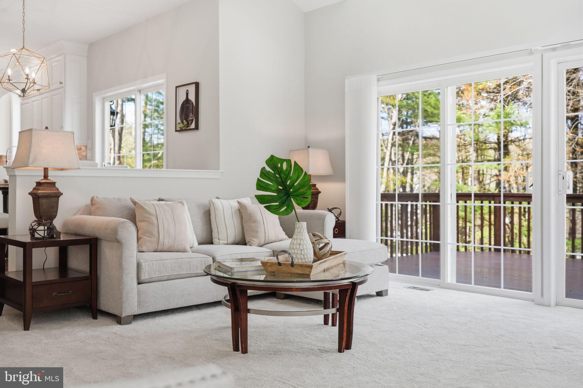 520 Sunset Hollow Road West Chester, PA 19380 - Photo 28 of 68 a living room with furniture and a potted plant