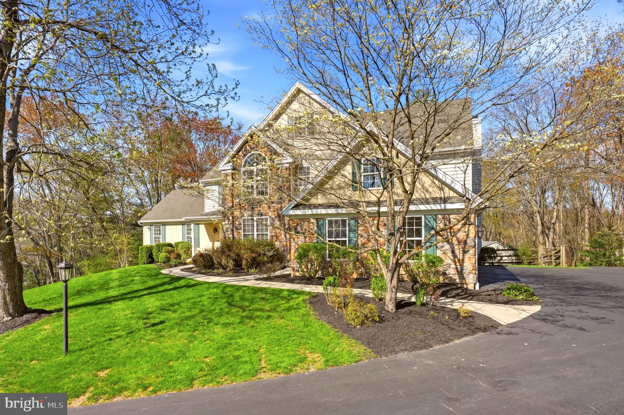 520 Sunset Hollow Road West Chester, PA 19380 - Photo 3 of 68 a view of house with yard