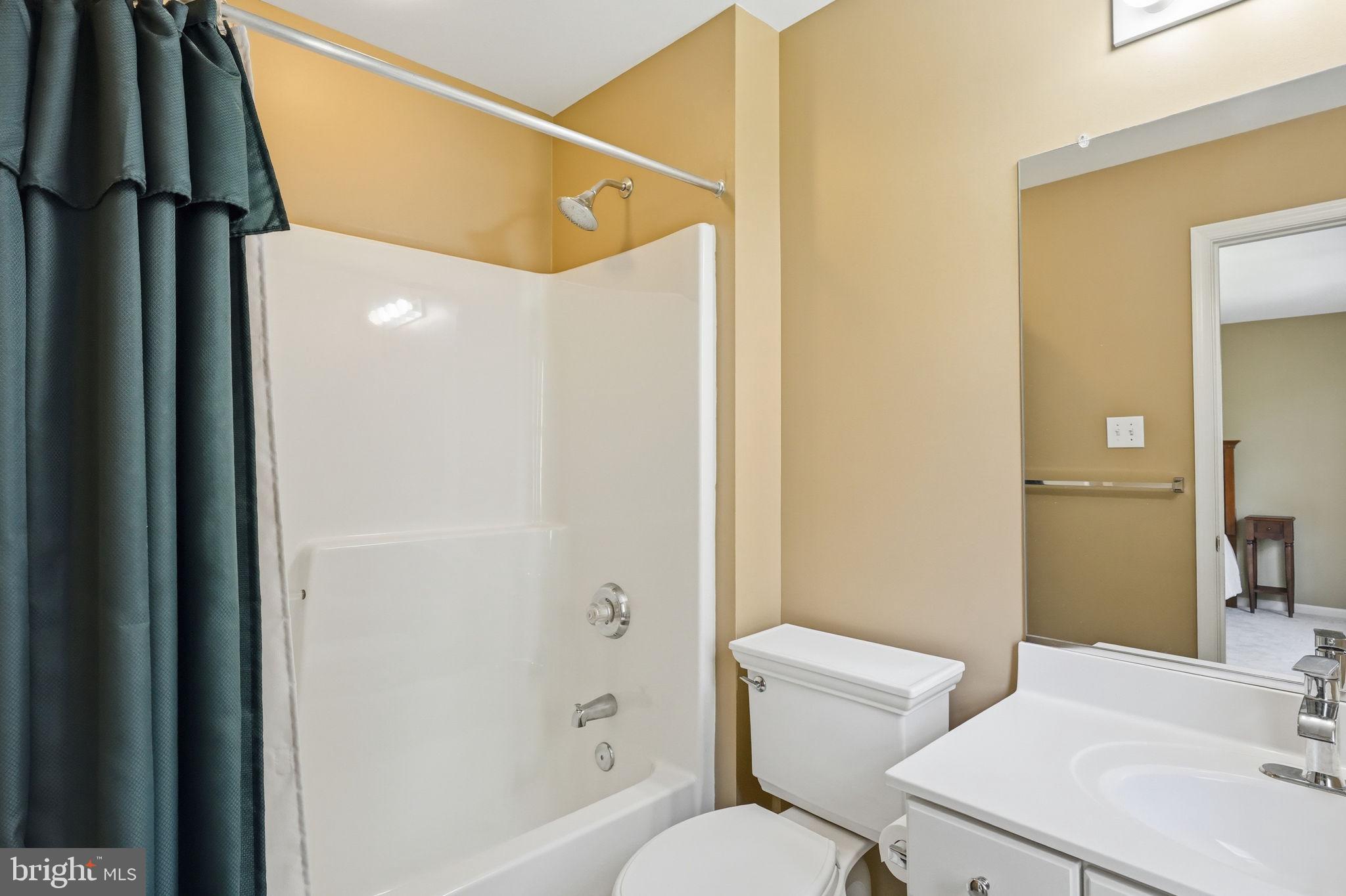 520 Sunset Hollow Road West Chester, PA 19380 - Photo 47 of 68 a white toilet sitting next to a bathroom sink