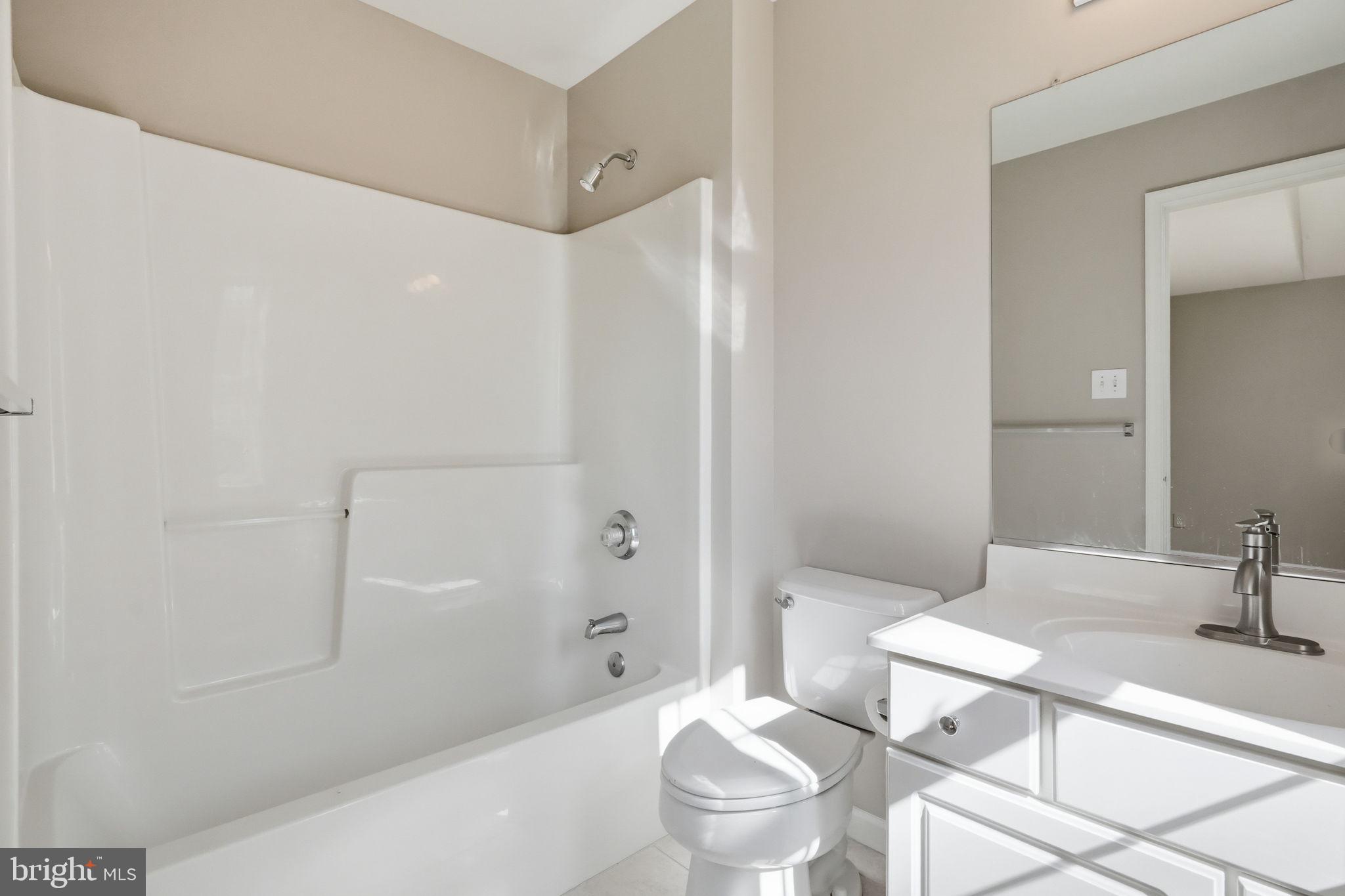 520 Sunset Hollow Road West Chester, PA 19380 - Photo 50 of 68 a bathroom with a sink a toilet and shower