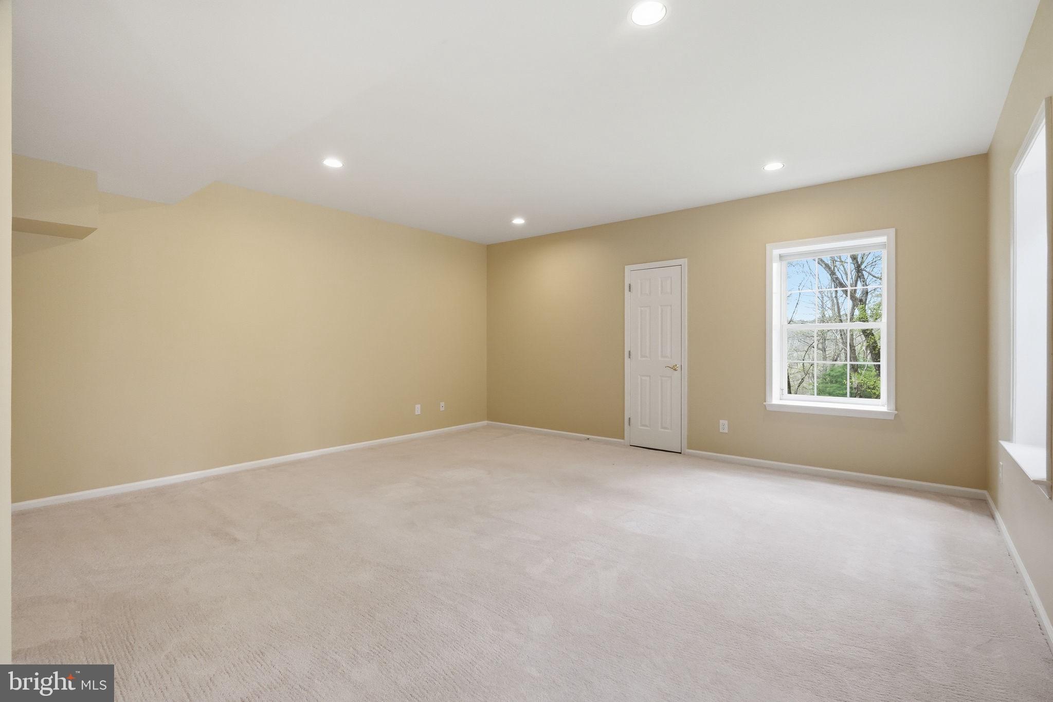 520 Sunset Hollow Road West Chester, PA 19380 - Photo 52 of 68 an empty room with windows and closet