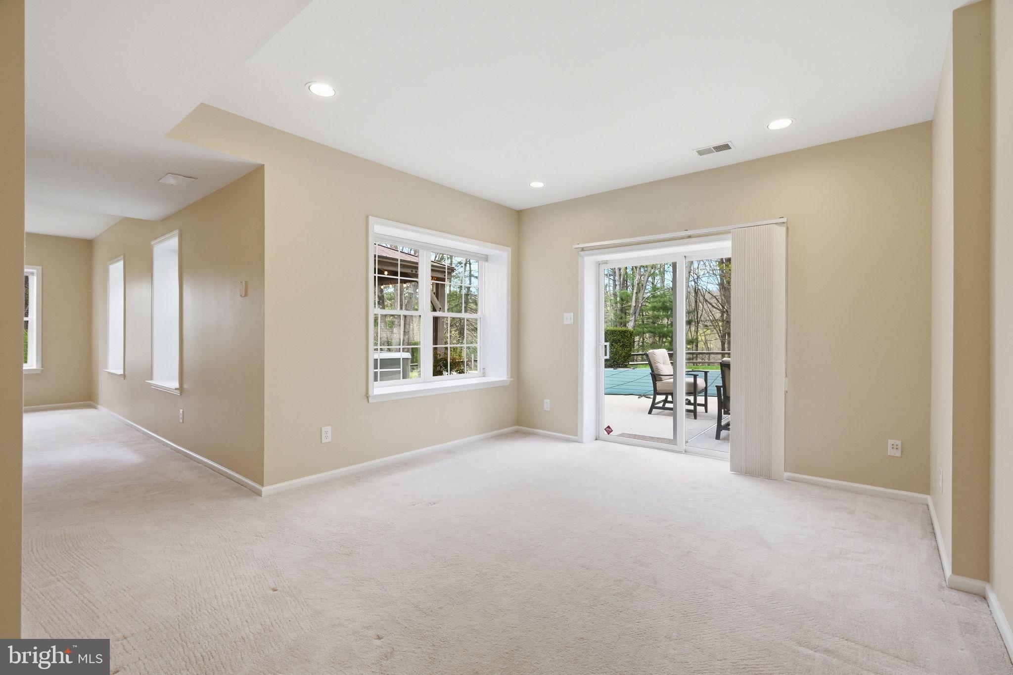 520 Sunset Hollow Road West Chester, PA 19380 - Photo 54 of 68 a view of an empty room with glass door and balcony