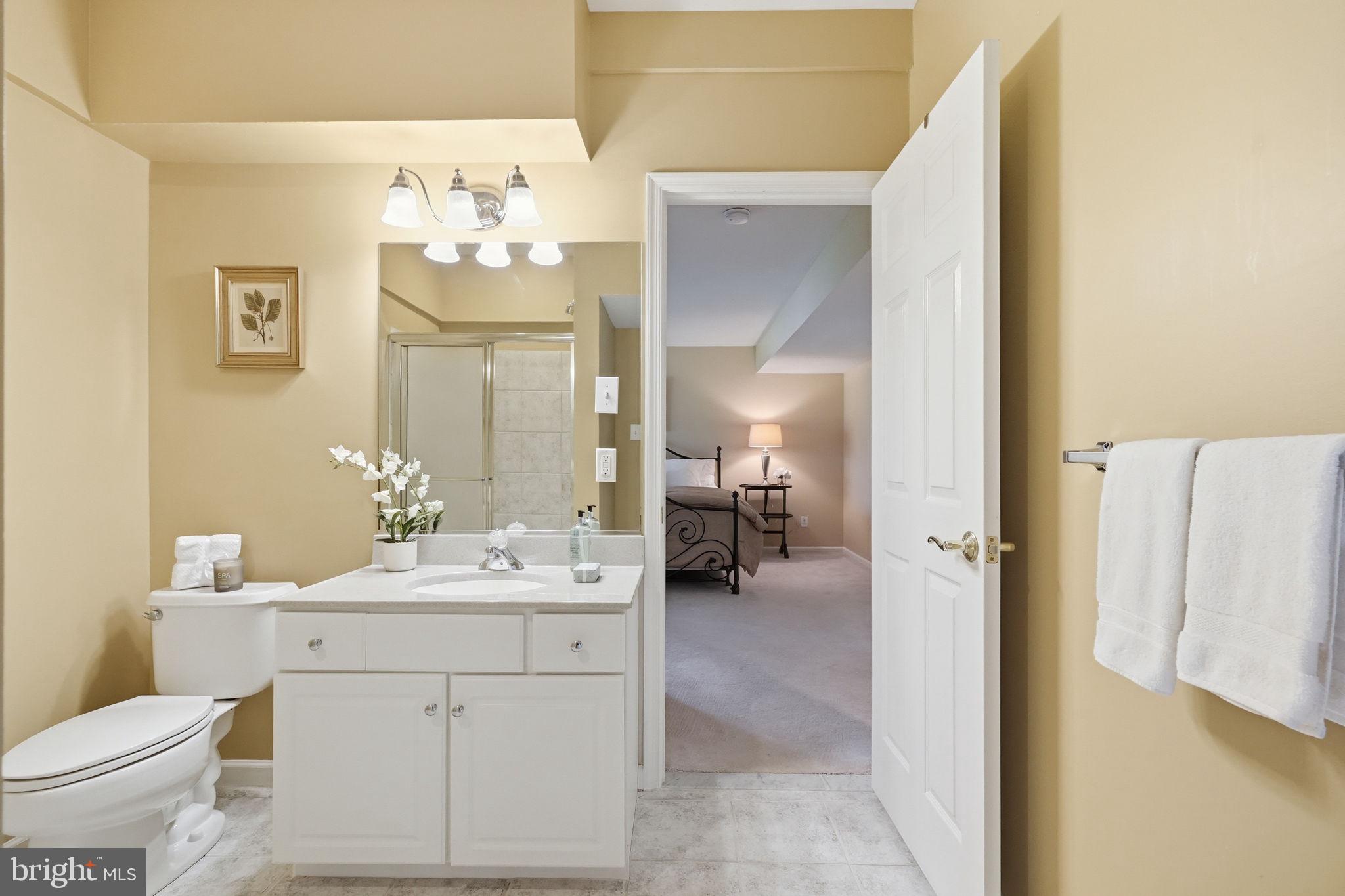 520 Sunset Hollow Road West Chester, PA 19380 - Photo 56 of 68 a bathroom with a sink double vanity and a mirror