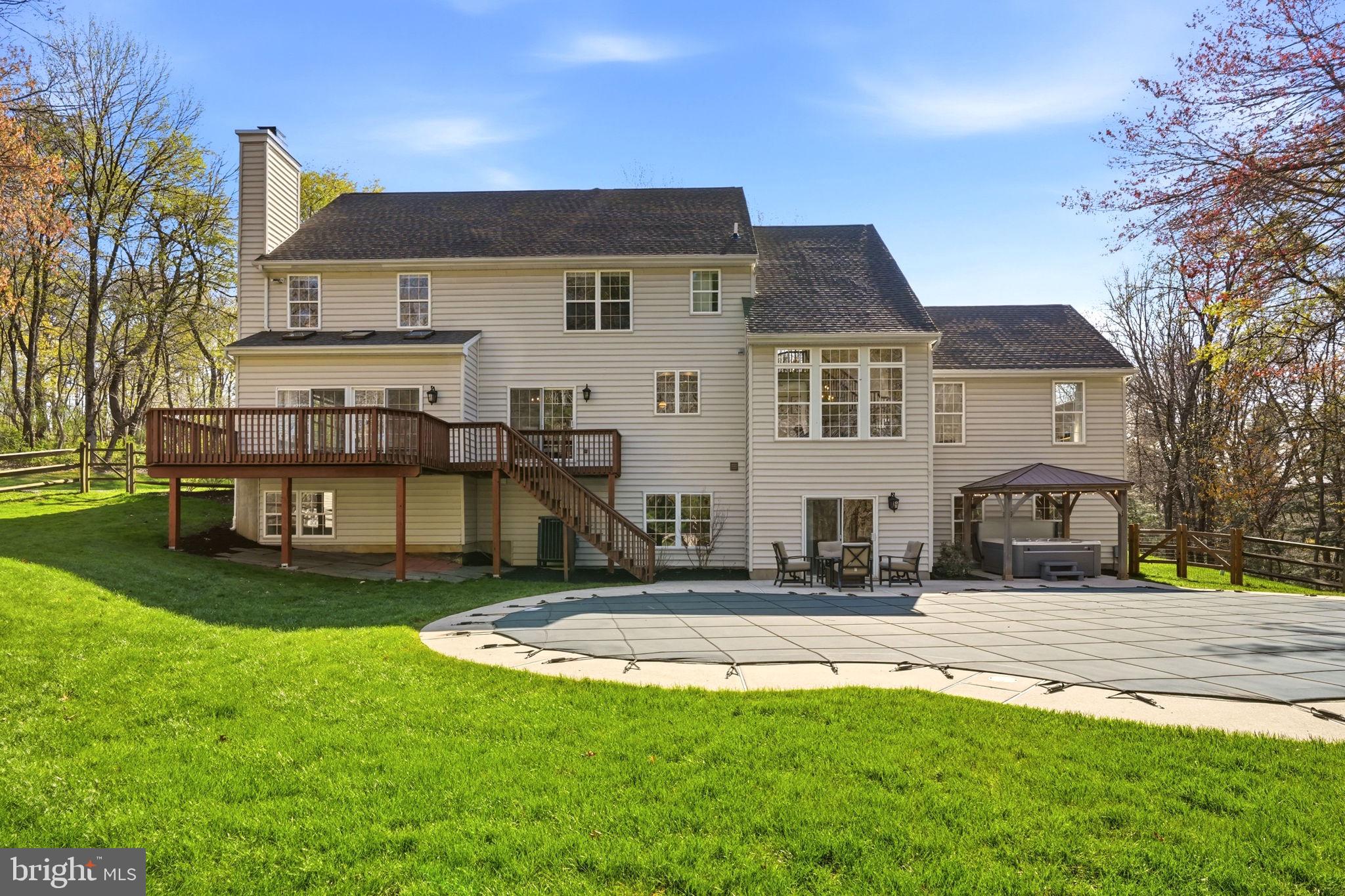 520 Sunset Hollow Road West Chester, PA 19380 - Photo 60 of 68 a front view of a house with a yard