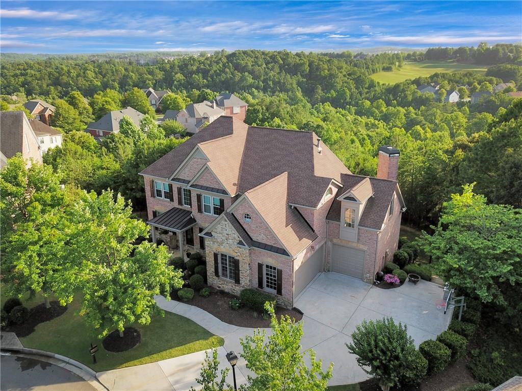 Welcome home to 2575 Goodrick Lane in the prestigious Grandview section of Winderemere, a swim/tennis/golf community in South Forsyth!