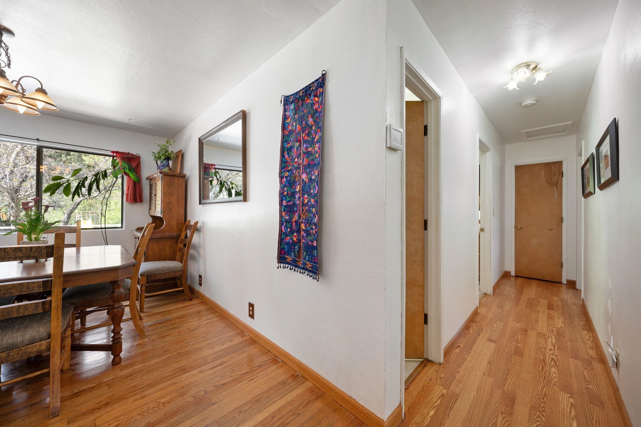 185 Smithneck Road Loyalton, CA 96118 - Photo 19 of 31 a view of a hallway with furniture and wooden floor