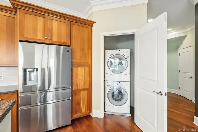 a view of a room with wooden floor and window