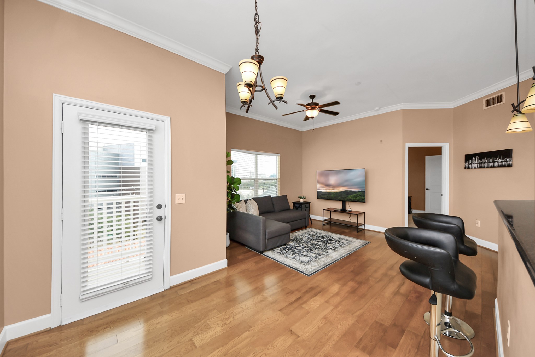 2203 Dorrington Street, Unit 400 Houston, TX 77030 - Photo 12 of 43 a living room with furniture and a window