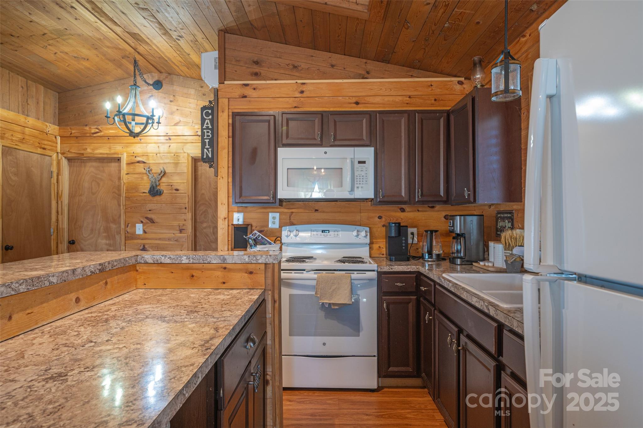 7042 Martin Lane Morganton, NC 28655 - Photo 12 of 26 a kitchen with a sink stove and cabinets