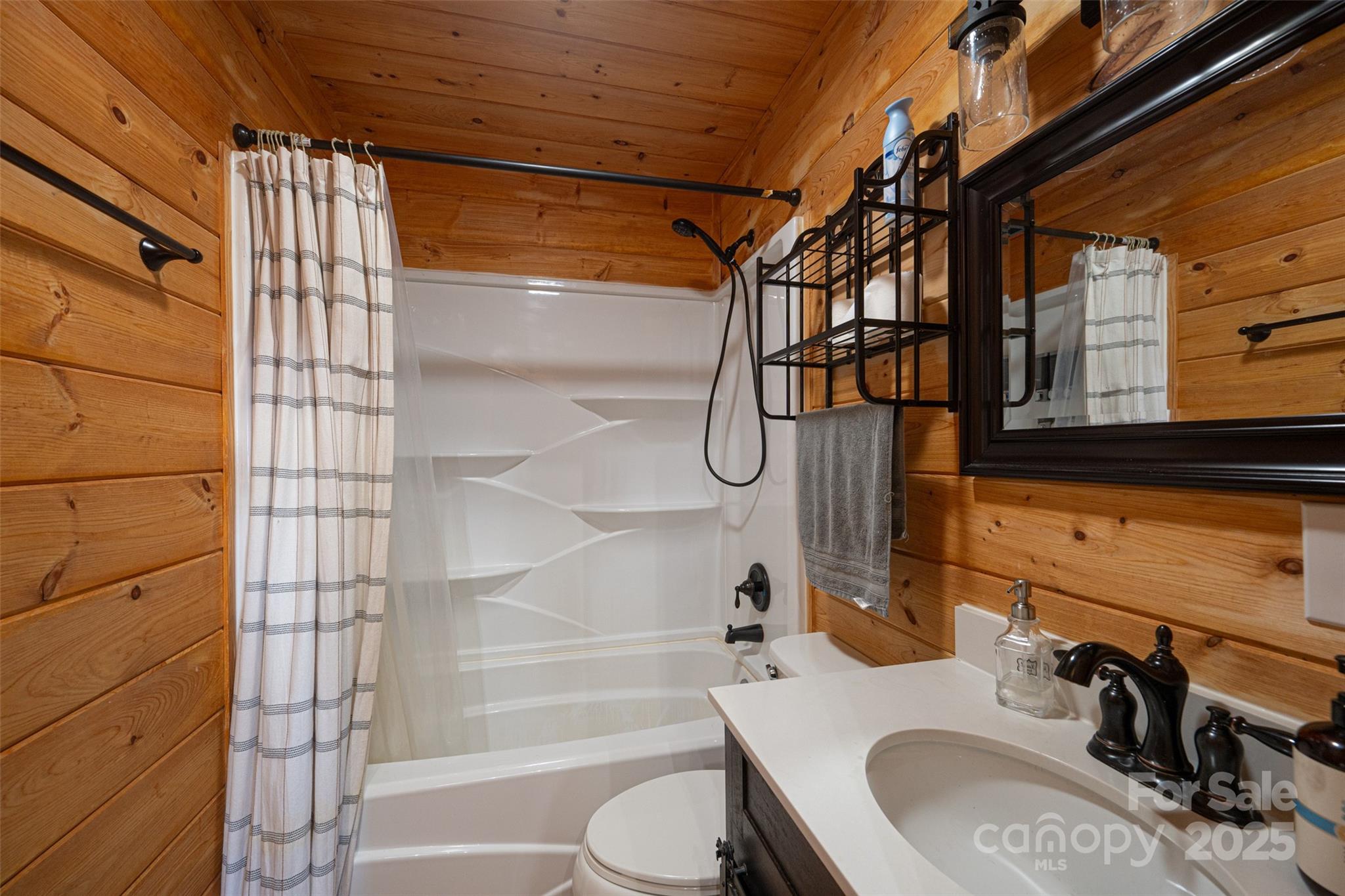 7042 Martin Lane Morganton, NC 28655 - Photo 16 of 26 a bathroom with a sink toilet and shower