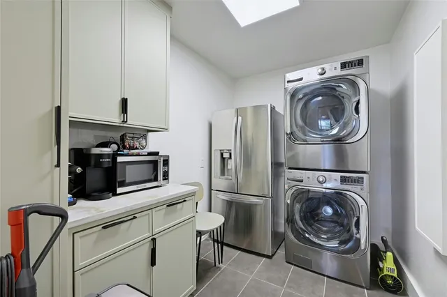 a kitchen with a washer and dryer