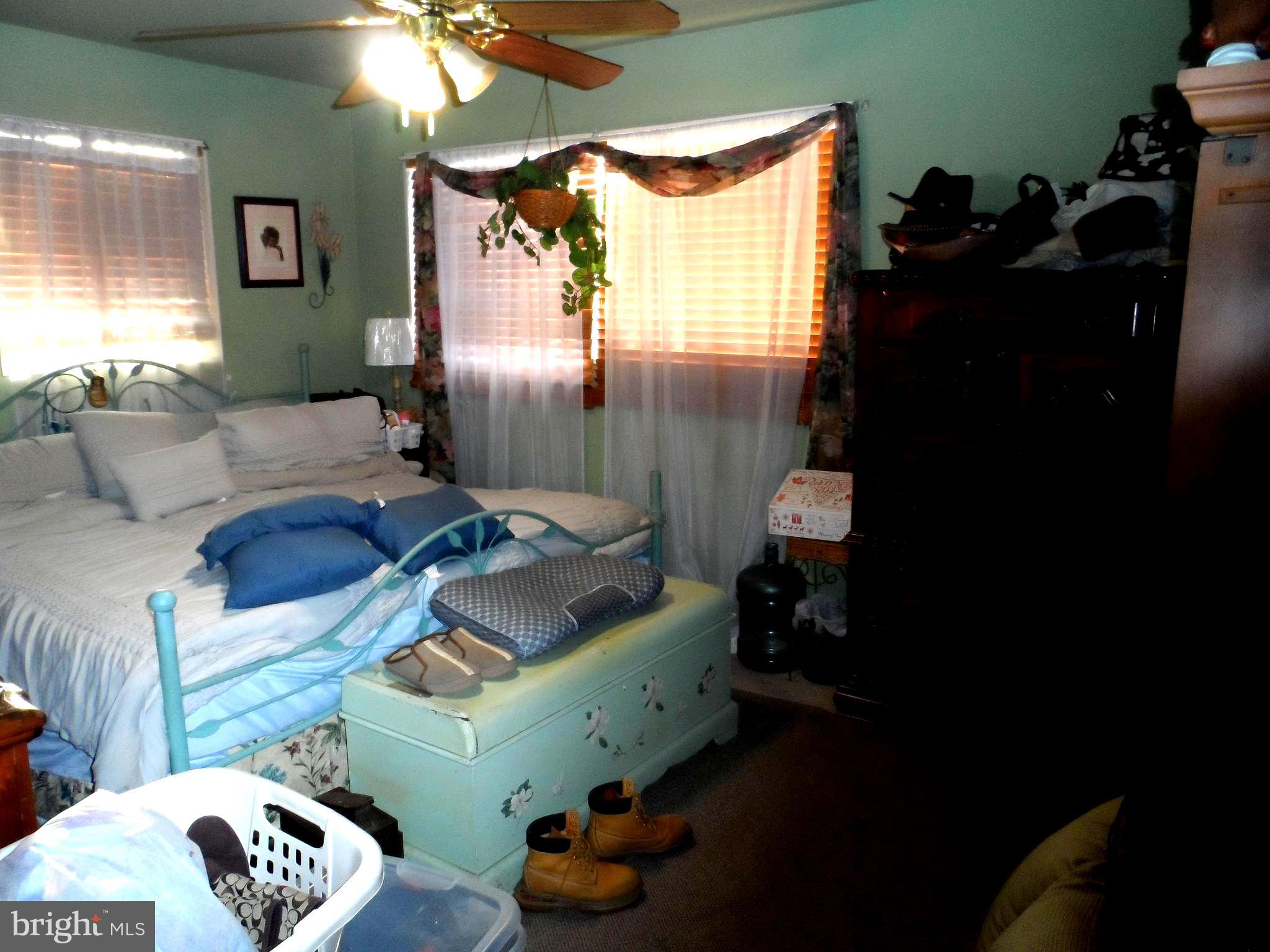 9405 Sierra Street Silver Spring, MD 20903 - Photo 9 of 19 a living room with furniture and a window