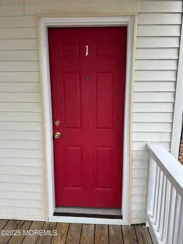 a view of a red door of the house