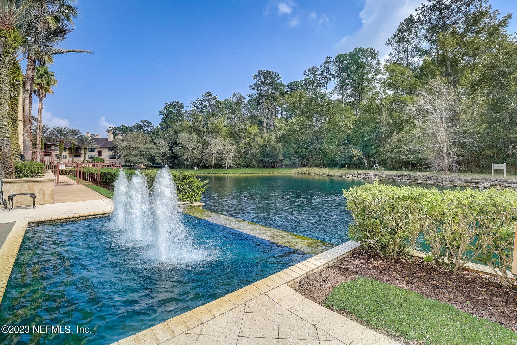 965 Registry Boulevard, Unit 307 St. Augustine, FL 32092 - Photo 28 of 31 a view of a lake from a yard