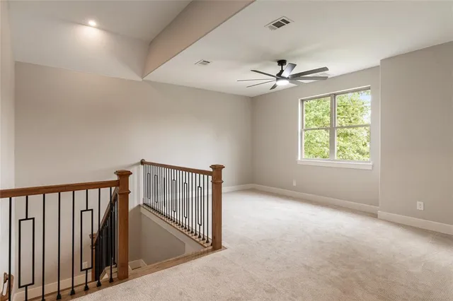 a bathroom with a double vanity sink mirror and shower