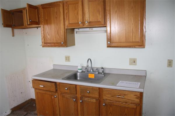 37 Anzio Road Athol, MA 01331 - Photo 5 of 9 a kitchen with stainless steel appliances granite countertop a sink dishwasher stove and cabinets with wooden floor