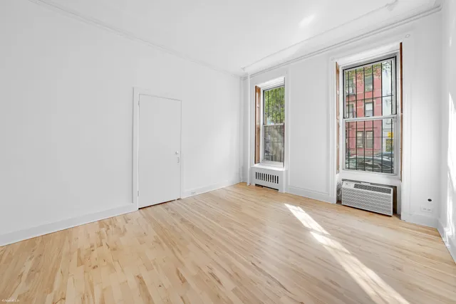 a view of an empty room and window