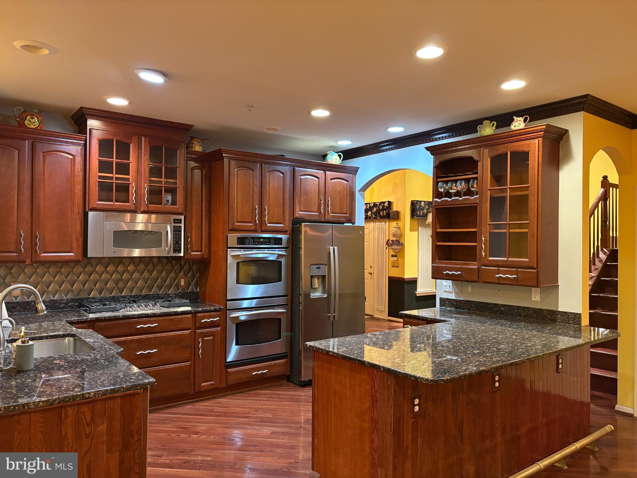 950 Nathaniel Trail Warminster, PA 18974 - Photo 17 of 66 Gourmet Kitchen with rich wood cabinetry.