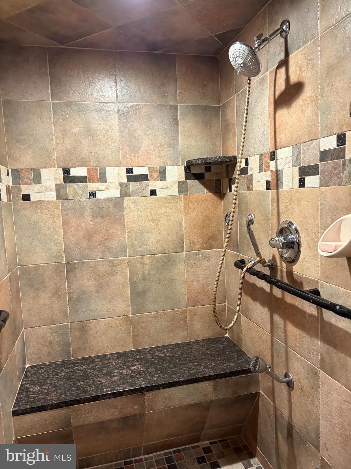 950 Nathaniel Trail Warminster, PA 18974 - Photo 24 of 66 Elegant tiled shower with modern fixtures.