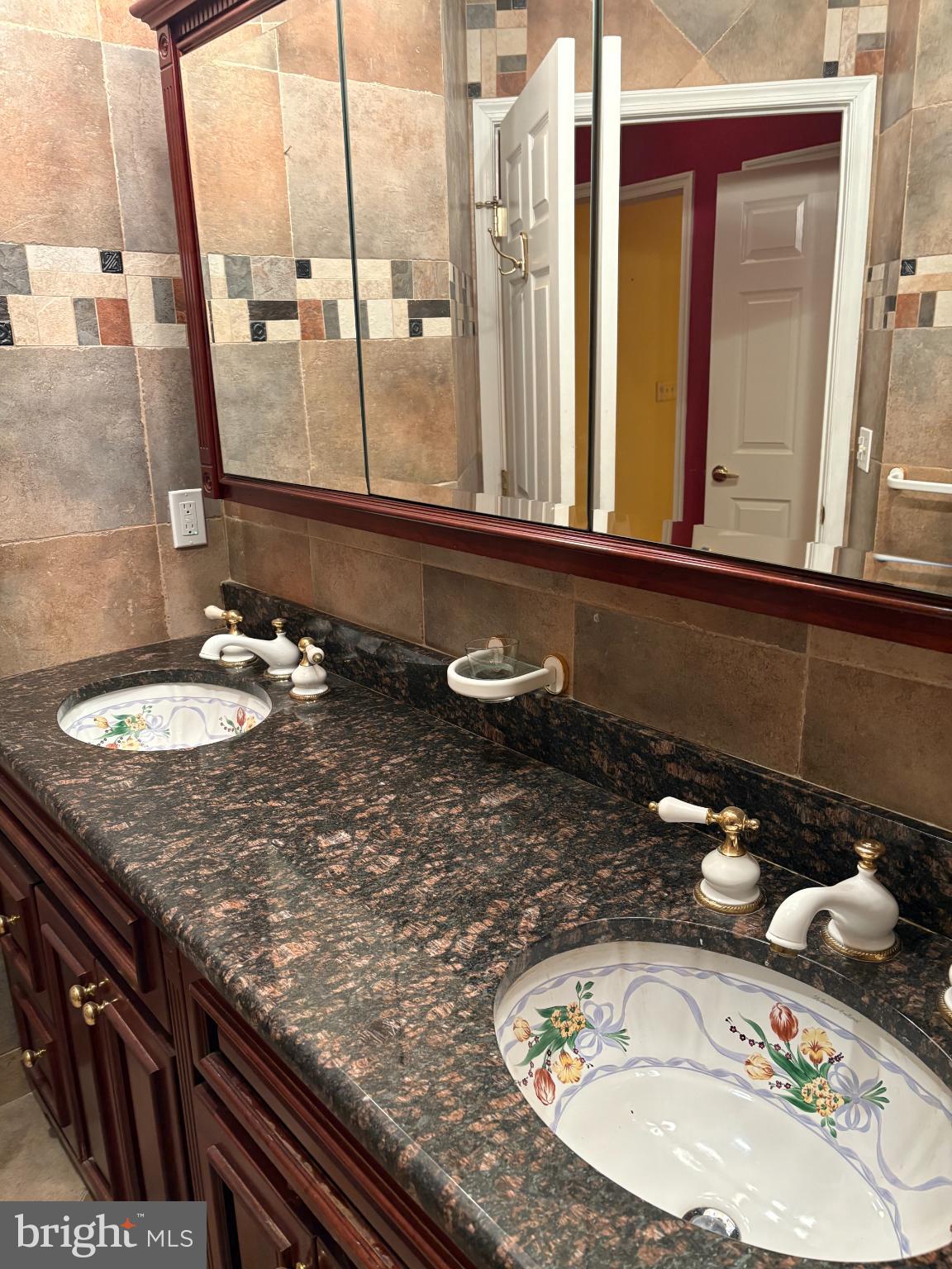950 Nathaniel Trail Warminster, PA 18974 - Photo 25 of 66 Elegant dual sinks with intricate detailing.