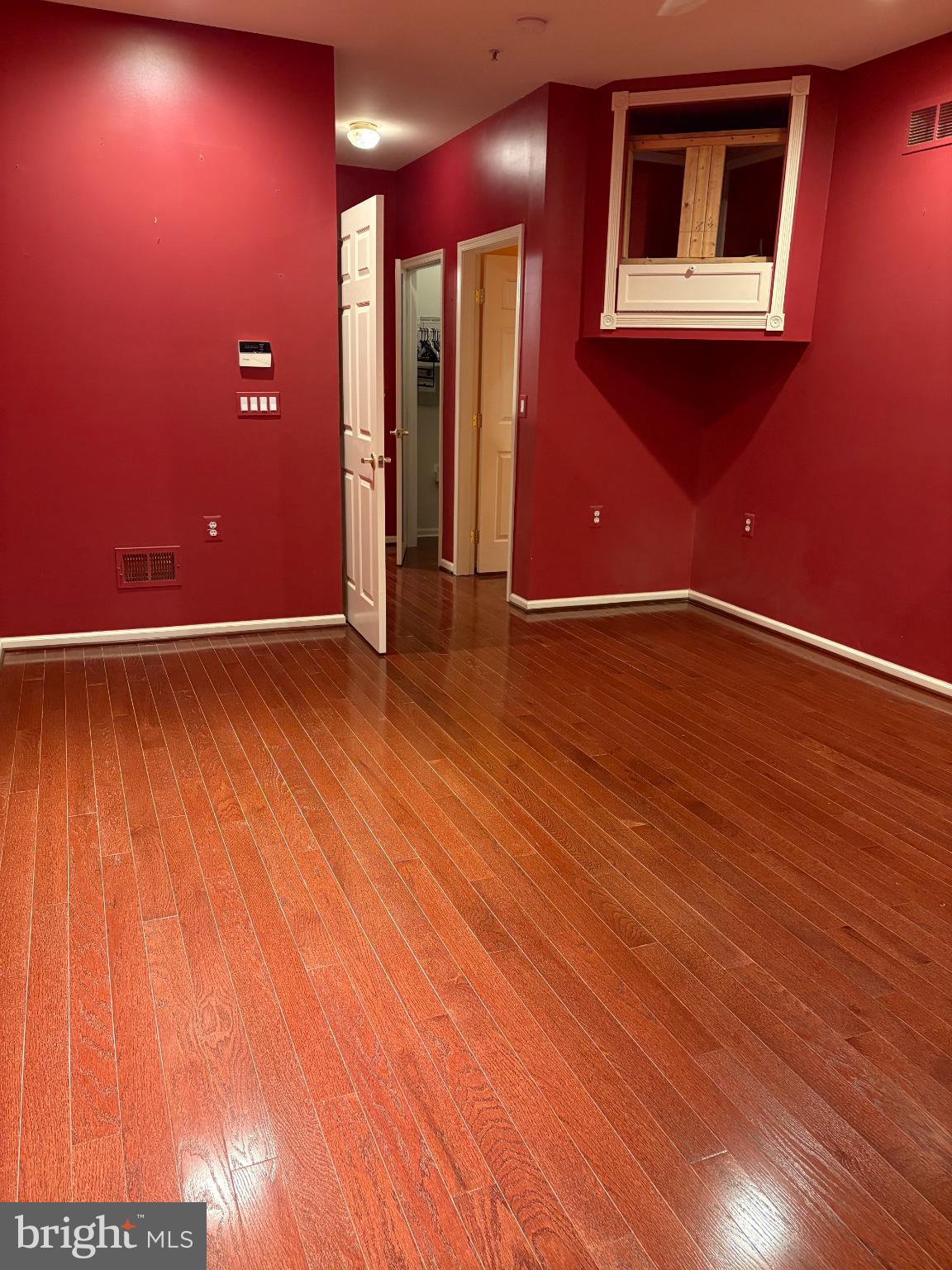 950 Nathaniel Trail Warminster, PA 18974 - Photo 29 of 66 Vibrant red walls enhance spacious elegance.