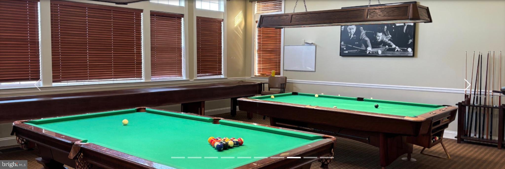 950 Nathaniel Trail Warminster, PA 18974 - Photo 56 of 66 Game room with vibrant green pool tables.