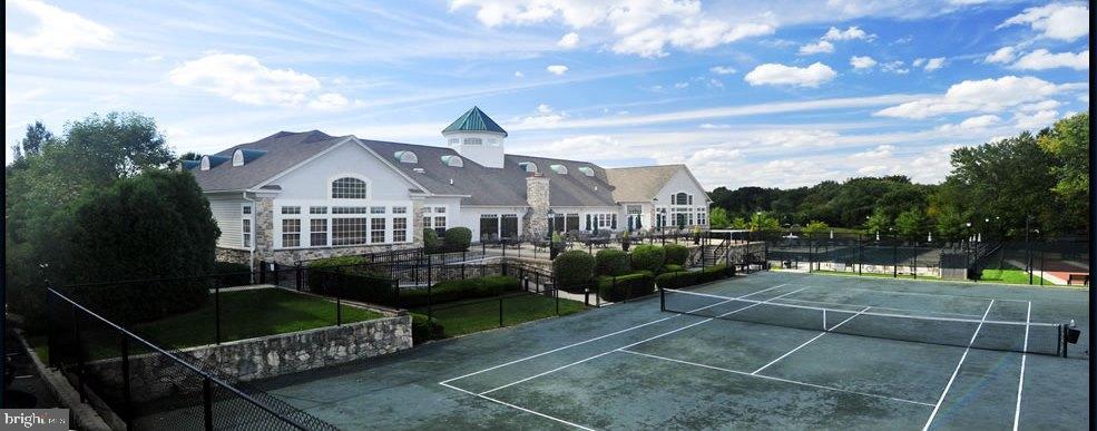 950 Nathaniel Trail Warminster, PA 18974 - Photo 63 of 66 Tennis courts beside a stunning clubhouse.