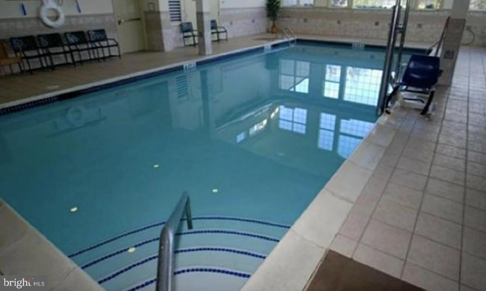 950 Nathaniel Trail Warminster, PA 18974 - Photo 8 of 66 Serene indoor pool with inviting waters.