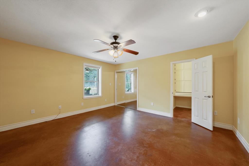 1070 Piney Grove Road Rusk, TX 75785 - Photo 17 of 39 wooden floor in an empty room with a window