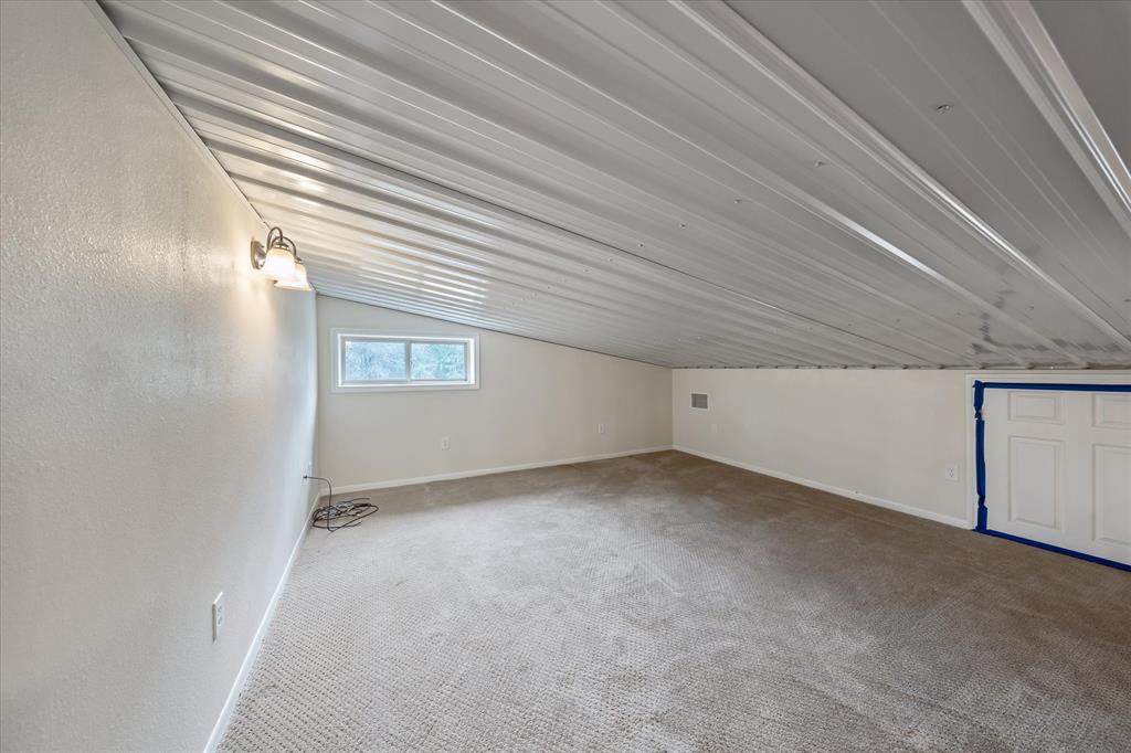 1070 Piney Grove Road Rusk, TX 75785 - Photo 21 of 39 an empty room with windows