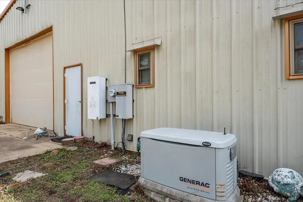 a view of a backyard with a lake view
