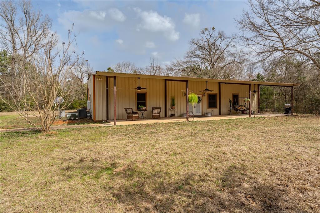 1070 Piney Grove Road Rusk, TX 75785 - Photo 4 of 39 a view of a house with a yard