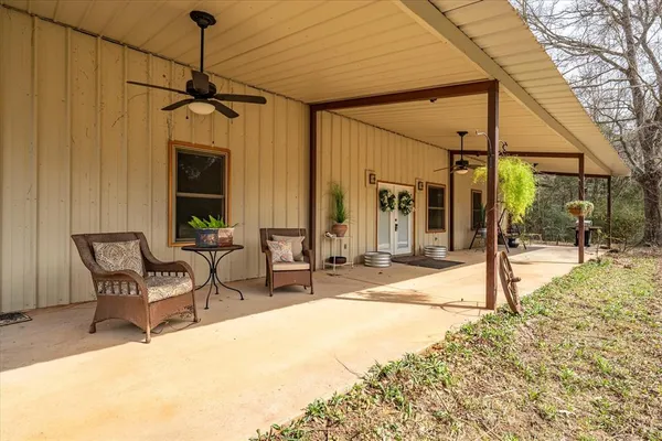 a bathroom with a toilet and shower