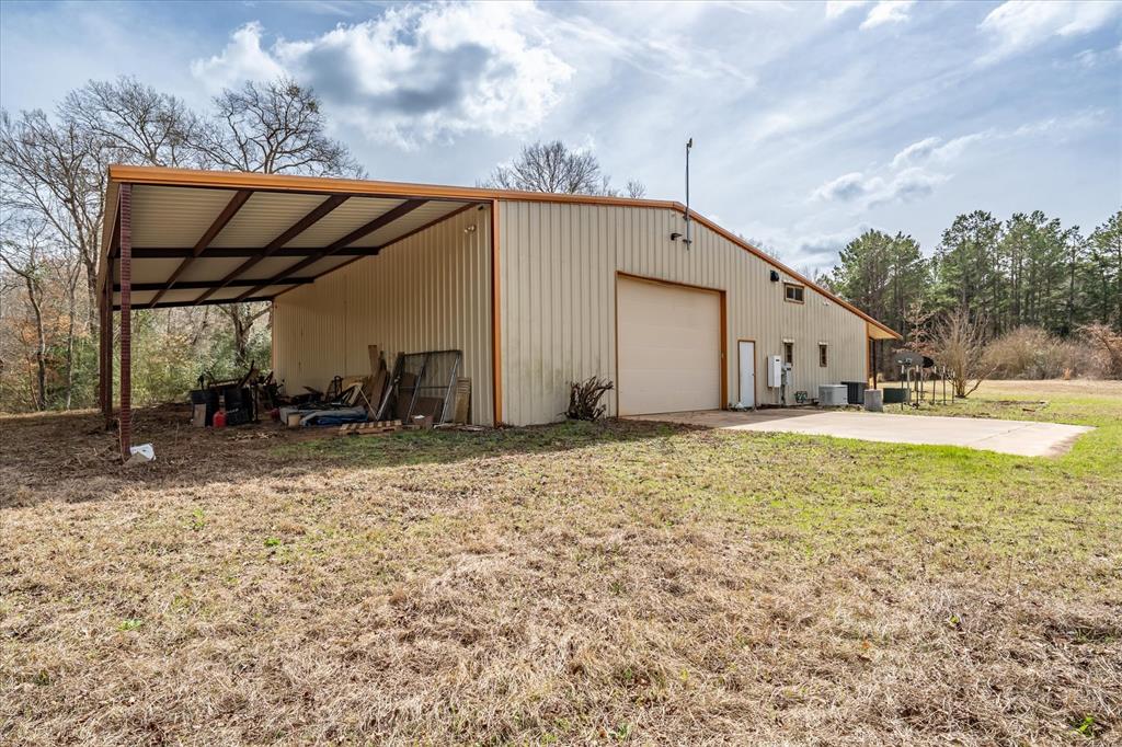 1070 Piney Grove Road Rusk, TX 75785 - Photo 6 of 39 a house view with a backyard space
