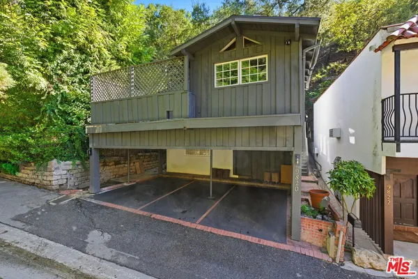 a front view of a house with a garage