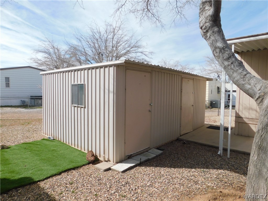 3003 Hualapai Mountain Road, Unit 55 Kingman, AZ 86401 - Photo 18 of 38 a view of a wooden fence