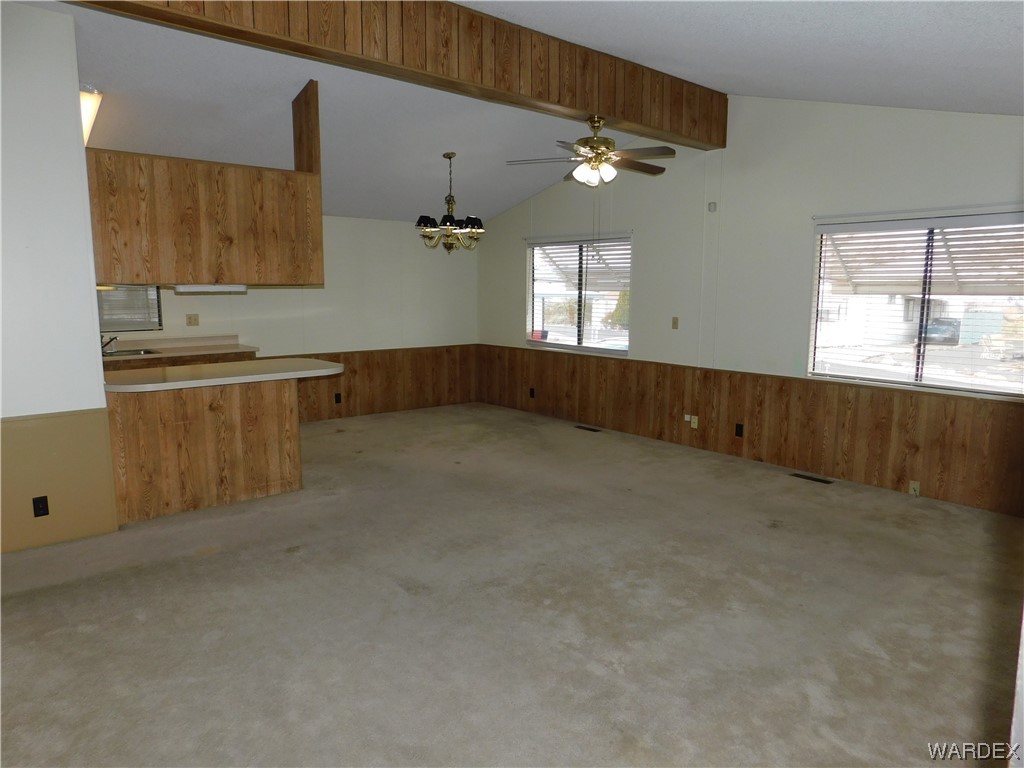 3003 Hualapai Mountain Road, Unit 55 Kingman, AZ 86401 - Photo 22 of 38 a view of a kitchen with a sink and cabinets